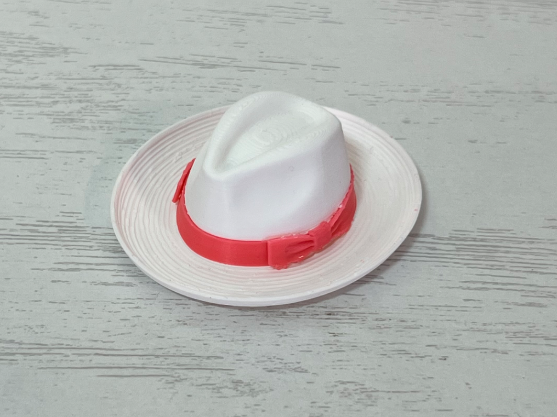 Curved Brim Hat with a Ribbon and Bows