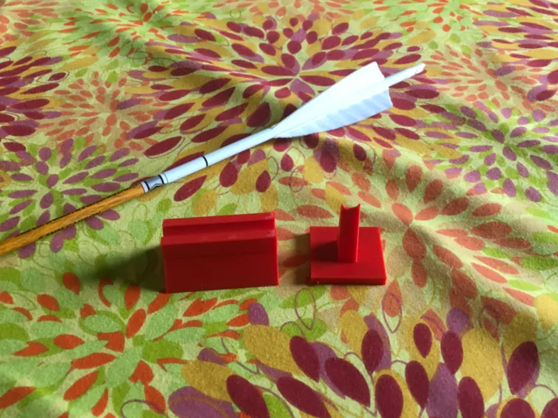 Arrow scale holder and foc locator