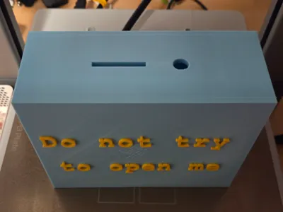 Non-openable piggy bank