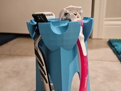 Multirazor holder for shower