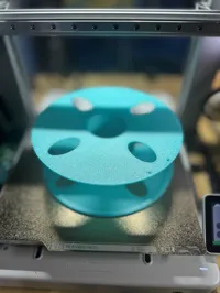 Larger openings to view filament. 0.2mm layer, 2 walls, 15% infill printed with PETG.