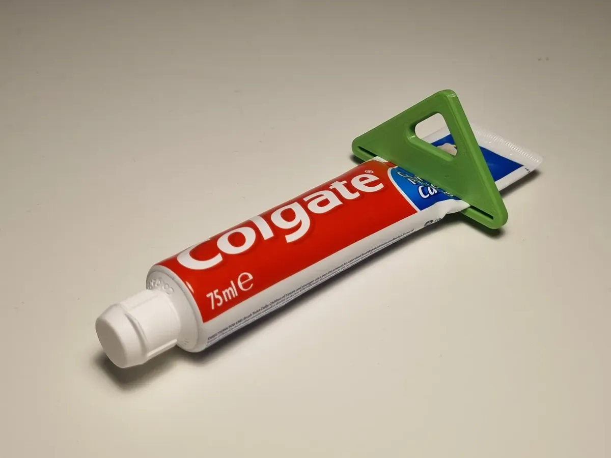 Presse-tube de dentifrice rapide