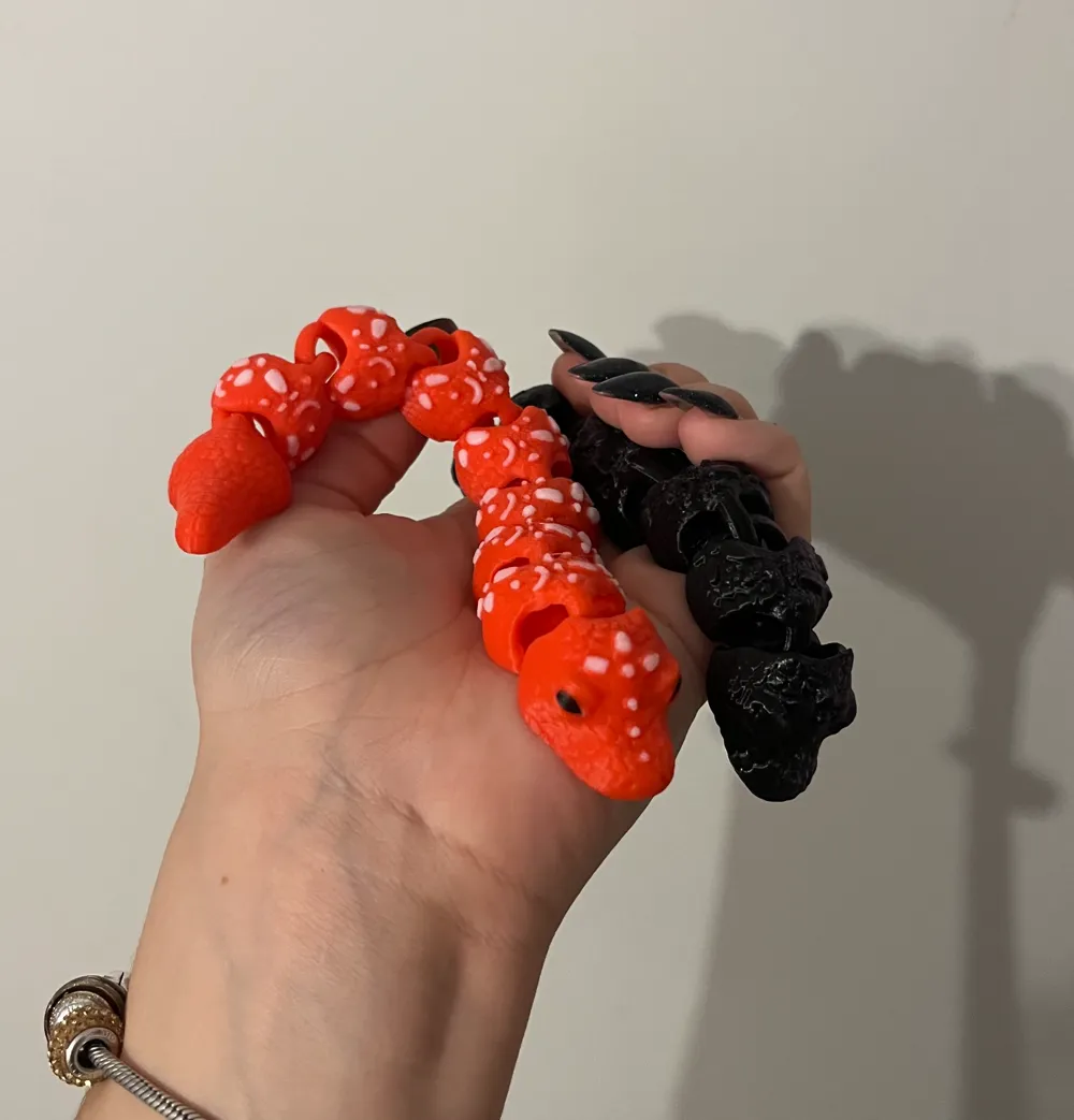 Articulated lunar year snake by Bash Studio 3D - MakerWorld