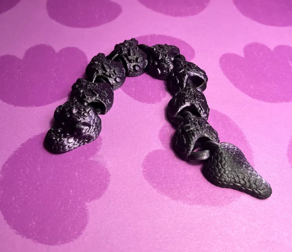 Articulated lunar year snake by Bash Studio 3D - MakerWorld