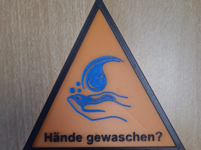 Warnschild: Hände gewaschen
