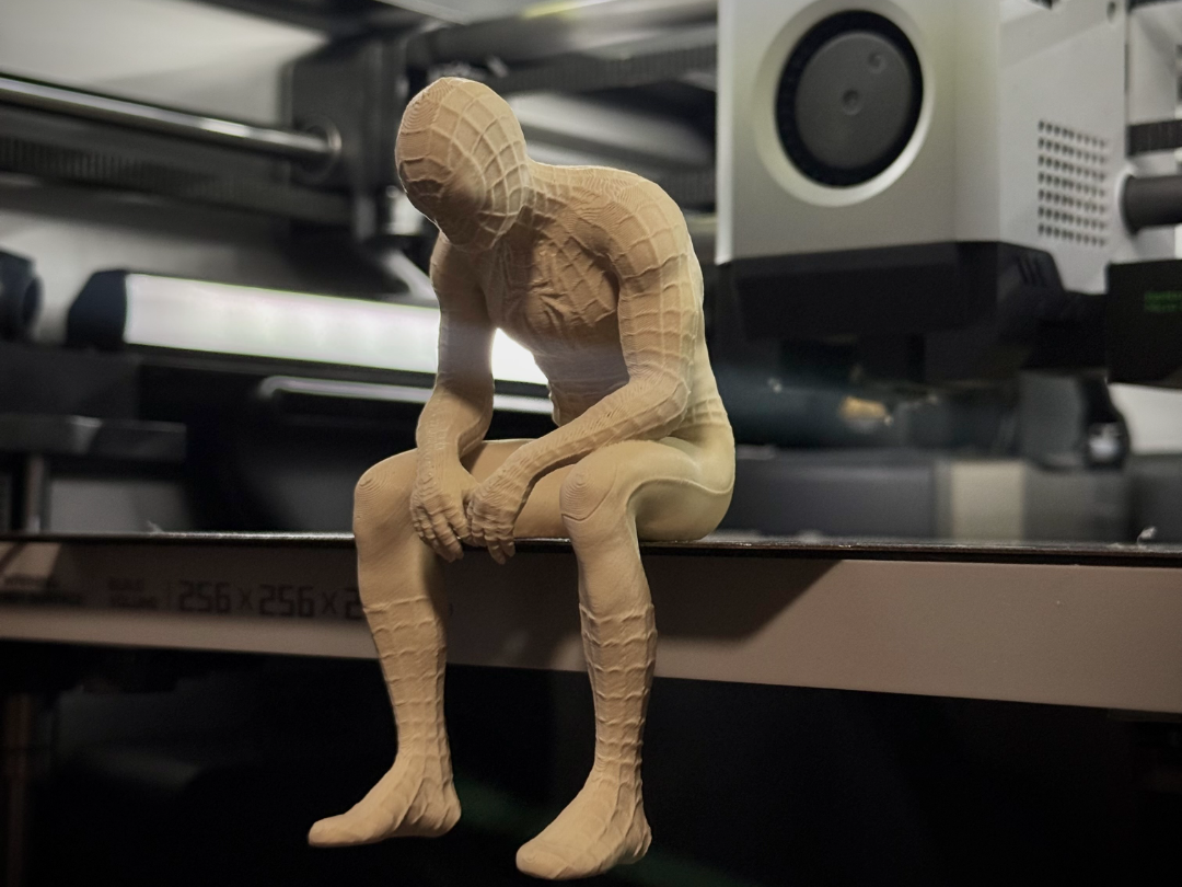 Sad Spiderman Sitting on a Ledge Figurine!