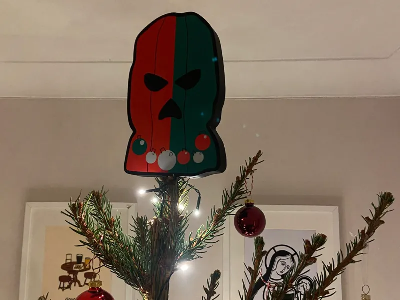 Kneecap Christmas Tree Topper
