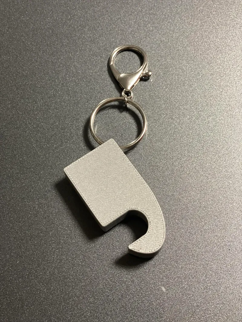 Porta chiavi con supporto telefono