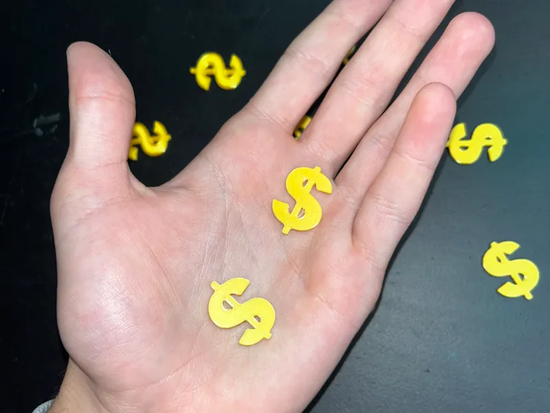 small dolar tokens / dollar coins dor fake money