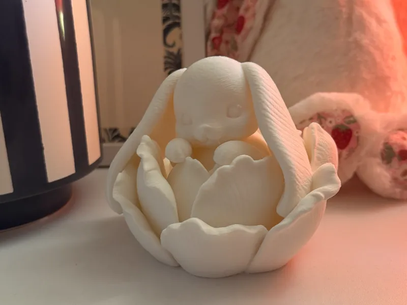 Blooming Bunny Baby Resting in a Flower Blossom