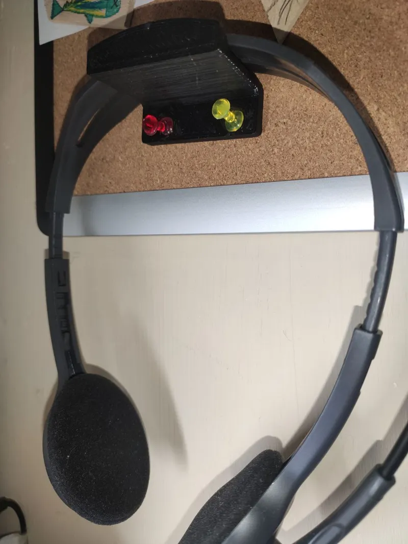 Headphone holder on cork board