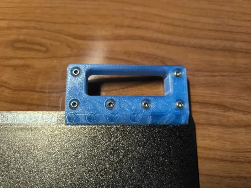 Overly and unnecesary reinforced bed handle for A1