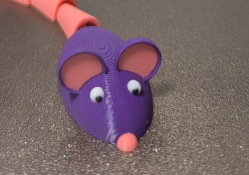 Mouse with articulated tail