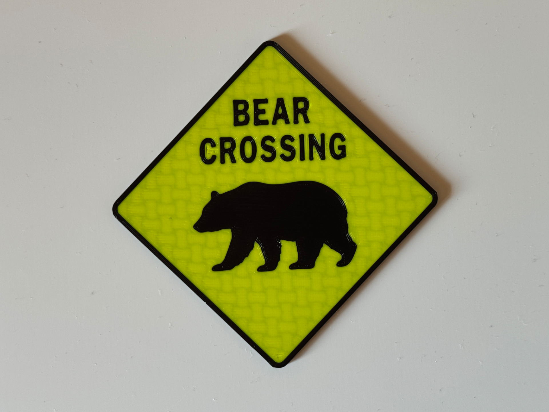 Bear crossing sign