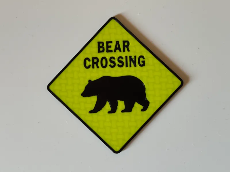 Bear crossing sign