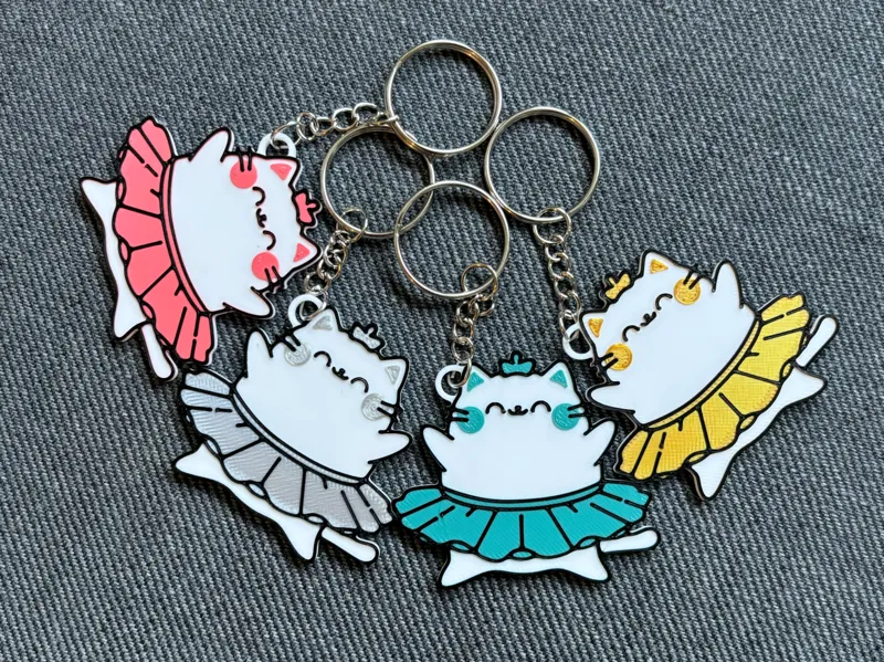 Cute dancing cat (wearing a tutu) keychain
