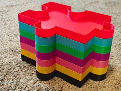 Stackable puzzle piece organizer