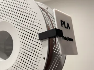 Filament clip and label holder