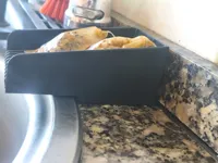 Perfil para escurrir bolsas de té