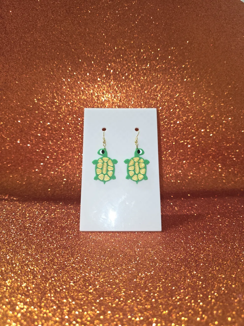 Baby turtle earrings view 2