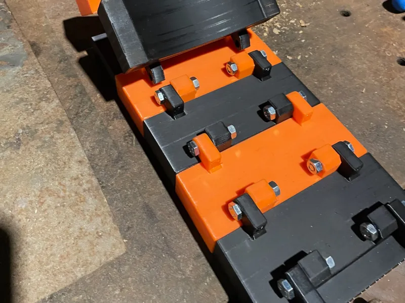 Erweiterbare Hobelwellenabdeckung mit Halter