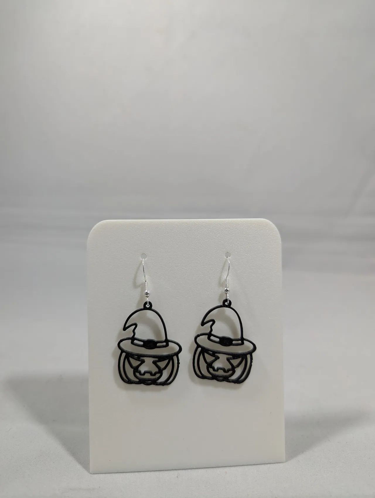 Pumpkin witch earrings view 2
