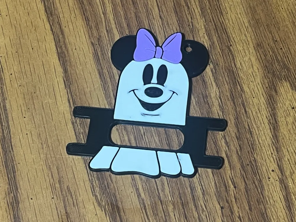 Accesorio para sujetar ligas de cabello: Minnie Mouse Ghost Hair Tie Holder. Referencia del modelo original.