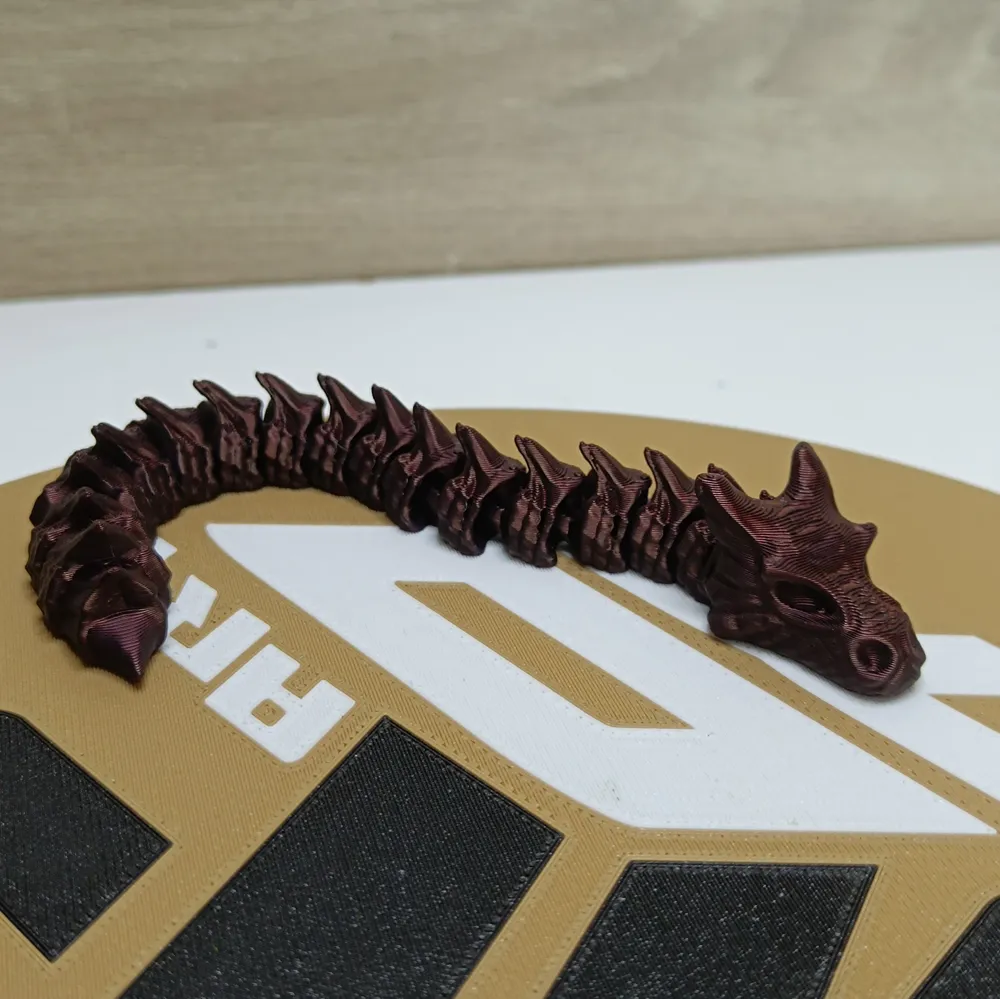 Flexible Dragon Wyrm V2 - Print in Place - Free 3D Print Model - MakerWorld
