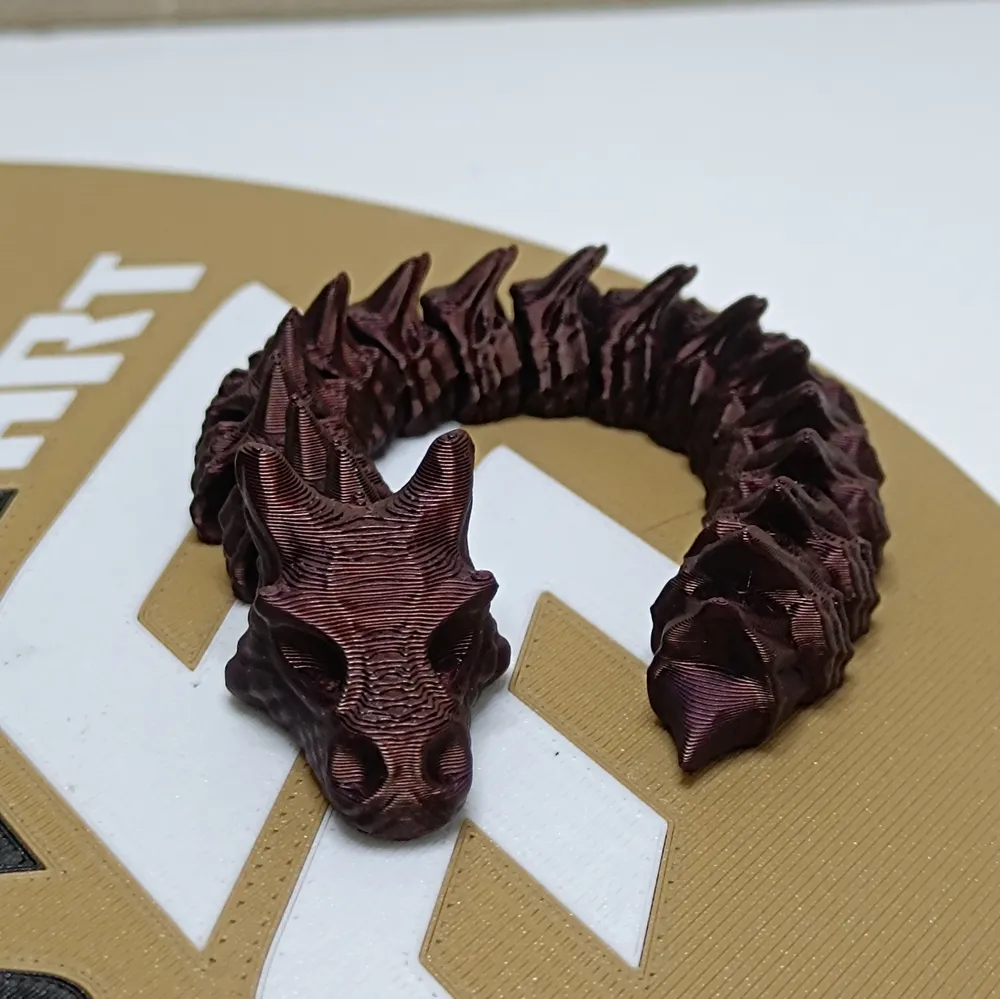 Flexible Dragon Wyrm V2 - Print in Place - Free 3D Print Model - MakerWorld