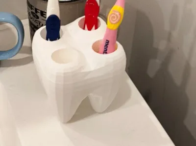 Grindstone toothbrush holder