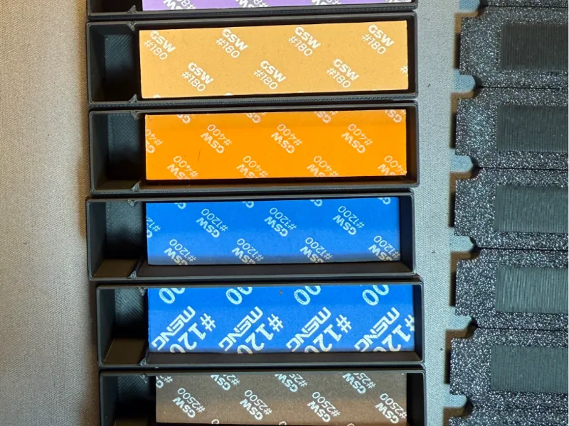 Sanding pads storage unit