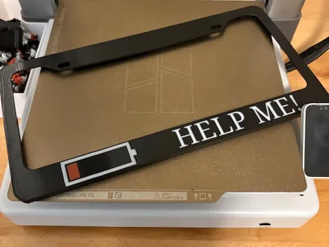 HELP ME! License Plate Frame