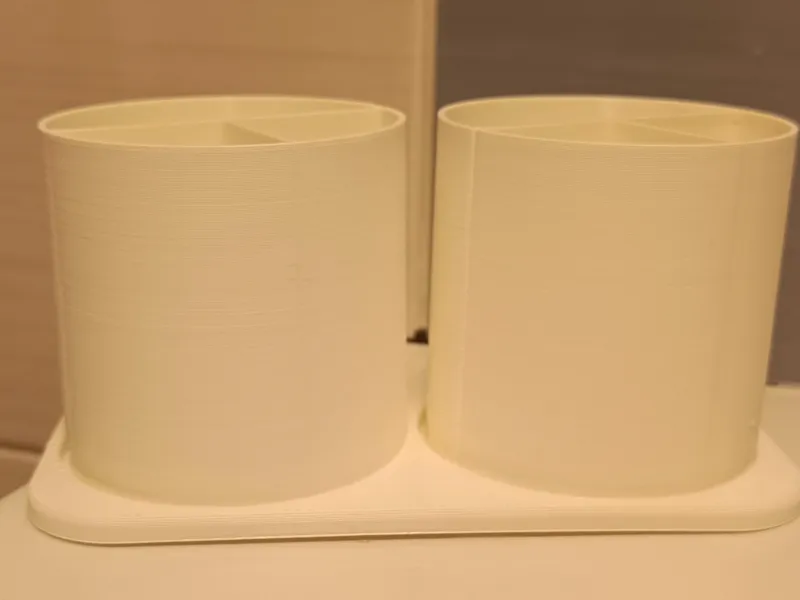 Simple toothbrush / toothpaste holder with a base