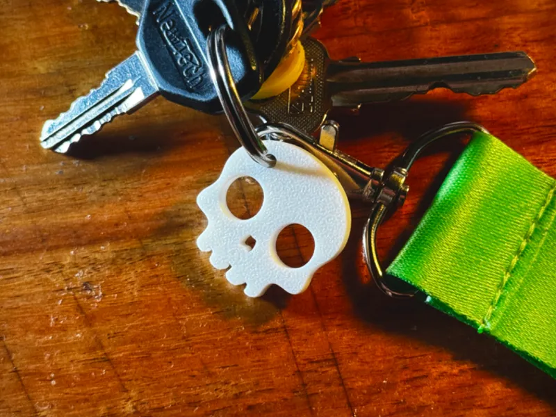 Bullet Hole Skull Keychain