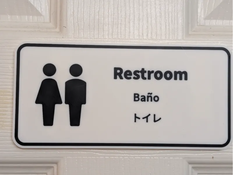 Bathroom sign - "Restroom / Bano / トイレ"
