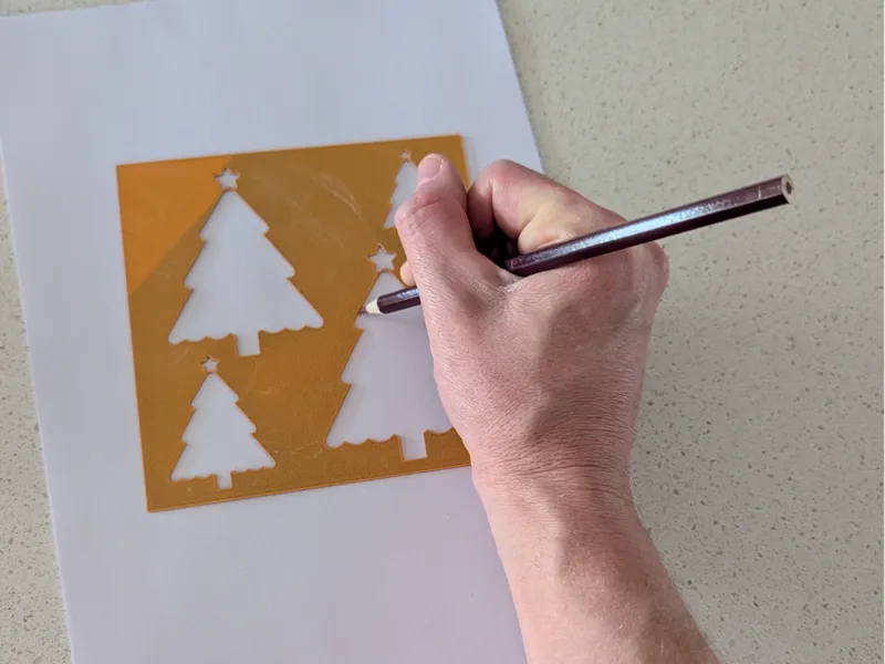 Drawing stencil - different sized Christmas tree's