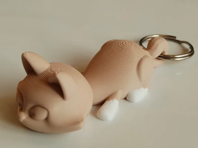 3D model of a cat keychain with a flexible neck