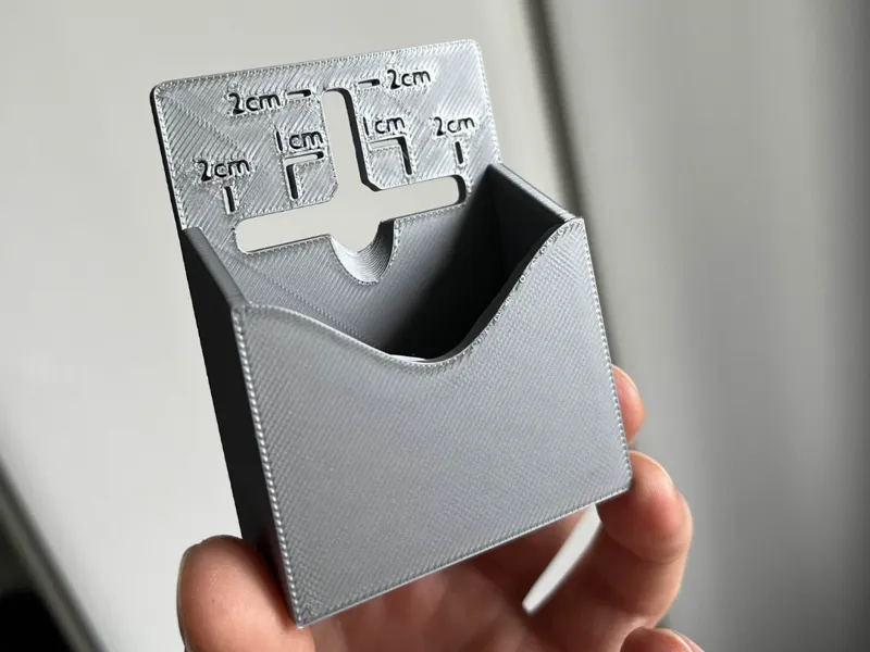 Simple ash/dust collector with built-in ruler