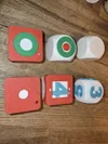 Small positioning aid for sticking labels on the cube