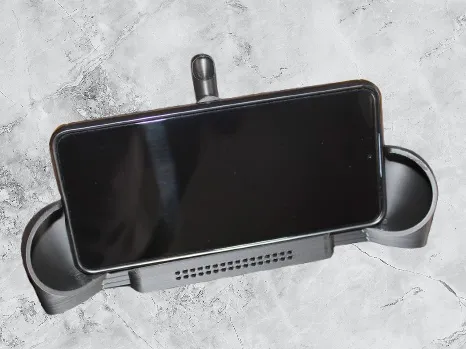 Phone Holder with Snack Bowl and Directed Sound