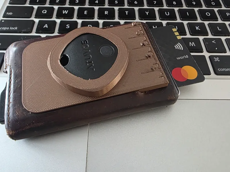 ATUVOS tag wallet holder.  Holds ATUVOS tag