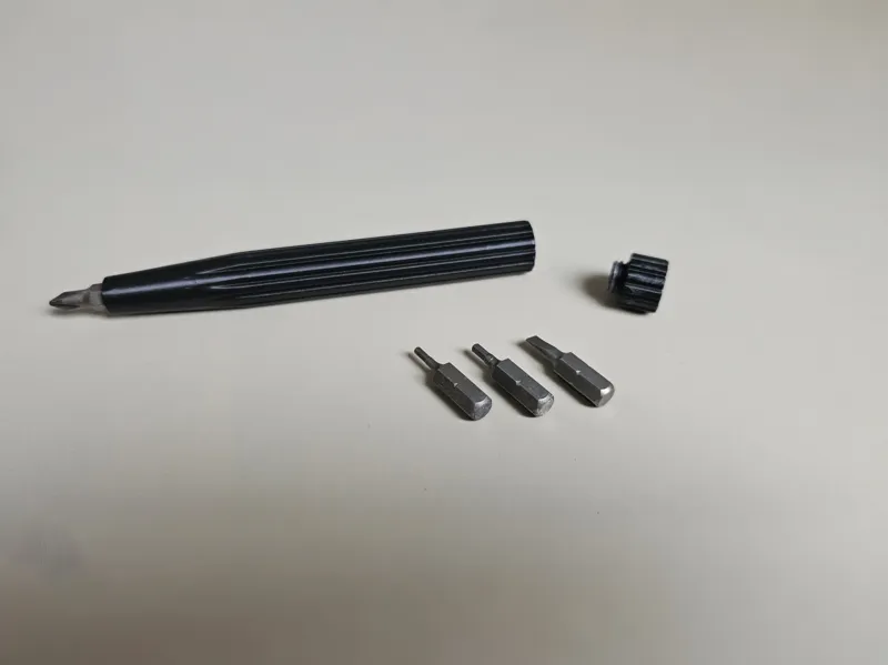 Screw Driver With Bit Storage