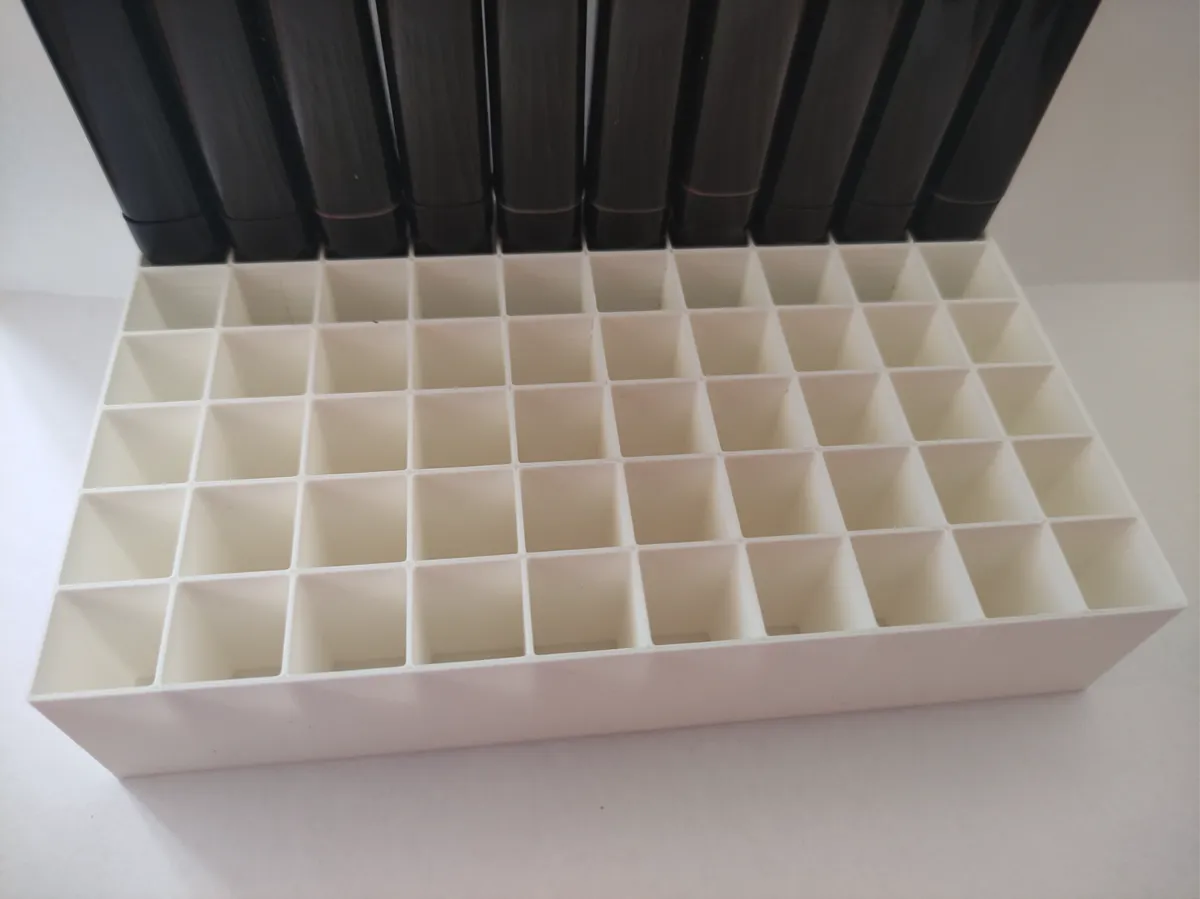 Grille de rangement pour marqueurs à alcool