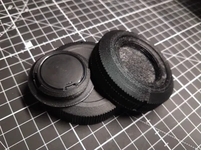 Canon RF Lenscap with screw-in OTag tracker