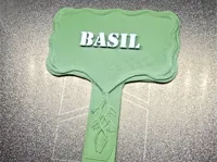 Basil and a Blank sign