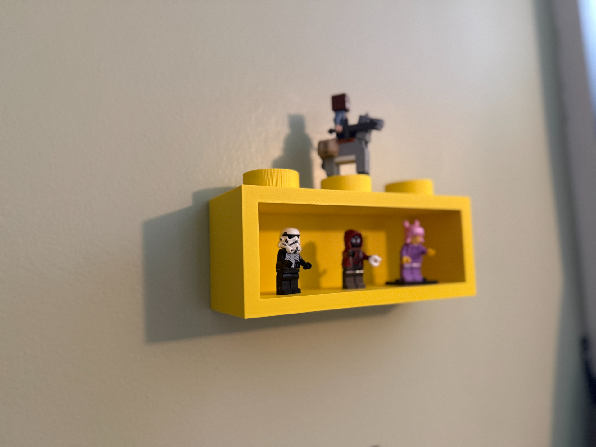 Brick LEGOS mini figure display shelf. 