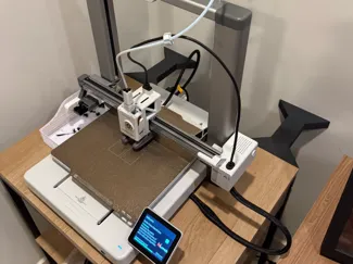 Anti wobble for printer desk