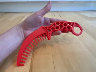 Combrambit (Karambit knife with comb blade)