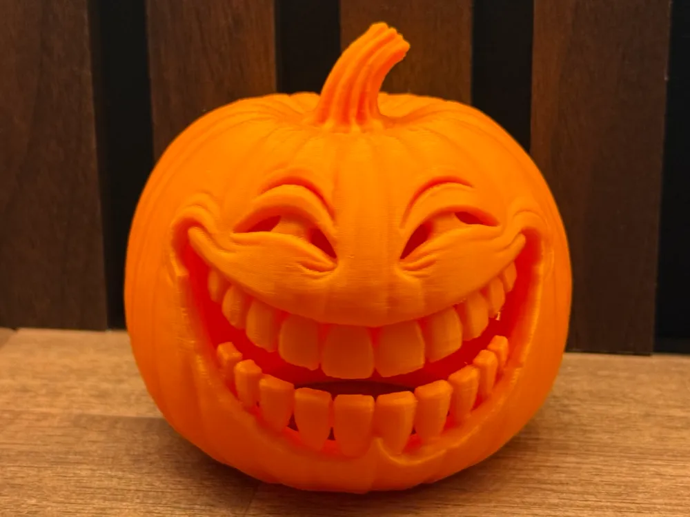 Accesorio de iluminación decorativa: The Grinning Pumkin - LED Tealight Holder. Referencia del modelo original.