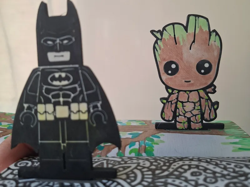 Batman and Groot surfing attachments
